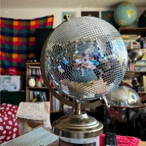 I make hand tiled disco globes